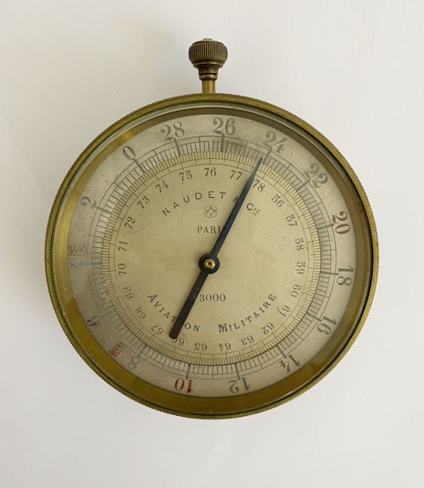 WWI French brass cased aircraft altimeter by Naudet & Cie, the silvered dial inscribed Aviation