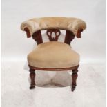 William IV / Victorian library chair, the curved upholstered back terminating in acanthus carved