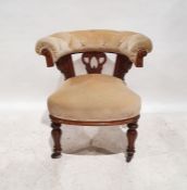 William IV / Victorian library chair, the curved upholstered back terminating in acanthus carved