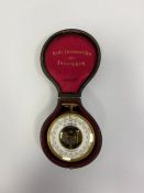 Brass-cased open-faced German skeleton pocket barometer,  the white dial named V.REG VERAND BETG,