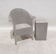 Lloyd Loom 'Lusty' wicker linen basket, a tub chair and one further chair (3)
