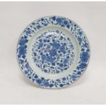 18th/19th century Chinese porcelain charger with underglaze blue decoration of scrolling foliage,