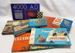 Two Boxes of vintage children's games and jigsaws to include Twister, Monopoly, Buccaneer, Go,