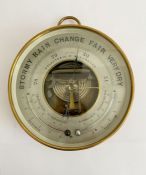Late 19th century French brass cased skeleton holosteric barometer, the silvered dial marked PHNB