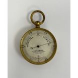Late 19th century gilt-metal pocket barometer produced by J H Steward of London, 4.7cm diam.
