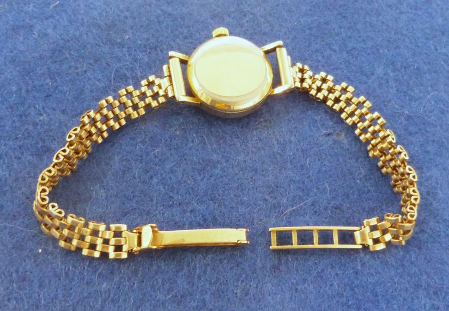 Lady's Longines wristwatch with gold coloured case, baton numerals and side button and the 9ct - Image 2 of 2