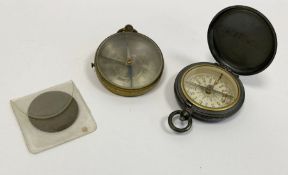 Small brass compass, a silver-plated pocket compass and a Victorian penny