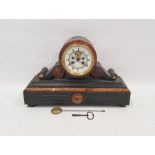 Late 19th century slate and marble mantel clock, drum shaped case mounted on decorated and carved