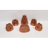 Selection of copper jelly moulds to include one pair, and one marker Trottier. Tallest mould is 20cm