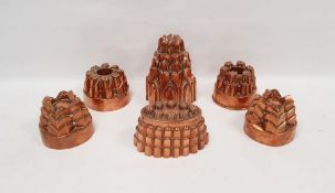 Selection of copper jelly moulds to include one pair, and one marker Trottier. Tallest mould is 20cm