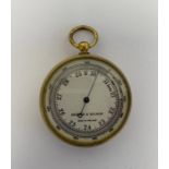 Edwardian gilt-metal pocket barometer by Griffin & George, with silvered dial, 4.7cm diam.