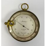 Brass cased Stanley of London compensated pocket barometer, circa 1900, with attached magnifying