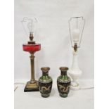 Fluted brass column oil lamp on stepped base with cranberry glass reservoir, converted to