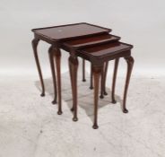 20th century mahogany nest of three tables, on cabriole legs