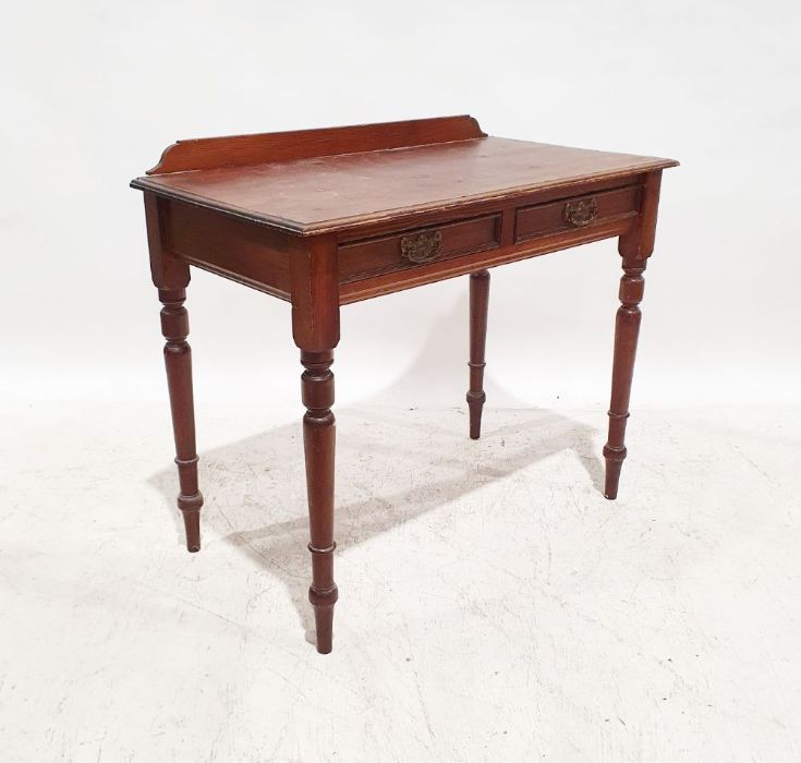 Edwardian pine side table, the rectangular top with moulded edge above two drawers, on turned