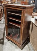 Victorian inlaid rosewood music cabinet with brass three-quarter gallery top, enclosed by single