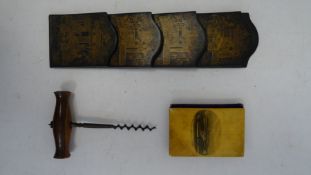 Victorian lacquered hanging letter rack, a vintage corkscrew and mauchlineware sewing kit