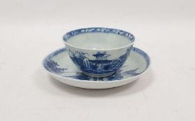 Chinese tea bowl and saucer from the Kangxi cargo painted with huts on islands in blue, Christie's