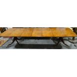 Good quality reproduction Regency mahogany extending dining table by Barry Cotton with three leaves,