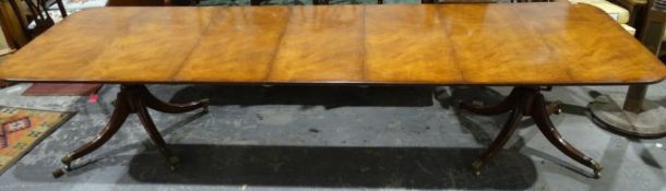 Good quality reproduction Regency mahogany extending dining table by Barry Cotton with three leaves,