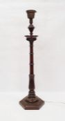 Carved wooden table lamp in the form of a pillar with acanthus leaf design, on a six-sided stepped