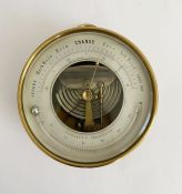 Naduet brass cased skeleton holosteric barometer, the silvered dial applied with fahrenheit