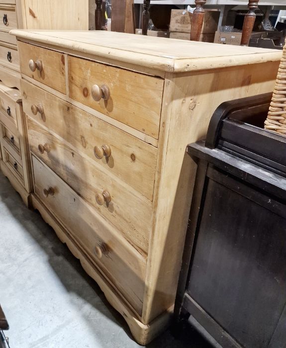 Vintage pine chest of two short over three long graduated drawers, on bracket feet, shaped apron,