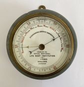 RNLI Fisherman's aneroid barometer by Dolland, the white dial numbered 2503, in metal casing, 16cm