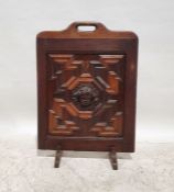 20th century oak fire screen with applied moulded mask decoration