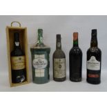 Five bottles of vintage and other port including a bottle of 1986 Quinta do Panascal Vintage Port,