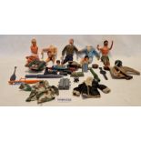 Four Action Man dolls together with a selection of Action Man accessories to include clothes,