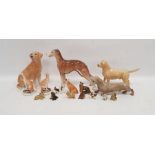 Collection of English pottery models of dogs, including a Melbaware labrador, a greyhound, a Beswick