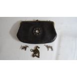 Small vintage handbag with a miniature clock inset to the interior showing the face on the outside