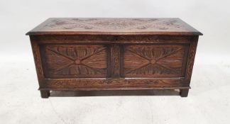 20th century oak blanket chest with carved top and front panels, on block supports, 48cm x 105cm x