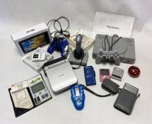 Collection of electronic items to include PlayStation 1, MID tablet, PC Raider joystick,