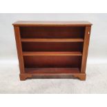 20th century mahogany and strung open bookcase, the rectangular top above three shelves, on