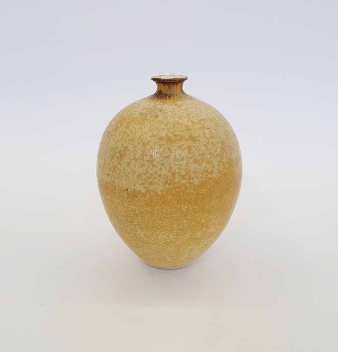 Hazel Johnston (1933 - 2011) a small studio porcelain vase with yellow speckled glaze, impressed