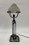 20th century lamp with frosted shade, on a wrought iron base with leaf decoration, 52cm high