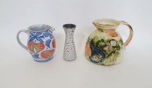 Andrew Hazeldon Aldermaston Pottery tin glazed earthenware jug with floral decoration, signed to