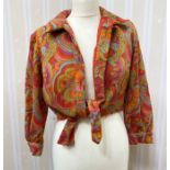 A 1970s crimplene psychedelic patterned jacket and matching full length skirt, skirt appears to have