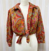 A 1970s crimplene psychedelic patterned jacket and matching full length skirt, skirt appears to have