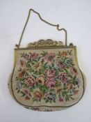 Vintage petitpoint evening bag labelled 'JSELY Lucerne, Vienna Handwork', cut steel trim to brass