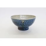 Steve Harrison (b.1967) a studio pottery salt glazed stoneware bowl with applied floral