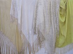 Three various Chinese embroidered shawls and a cobweb shawl (4)