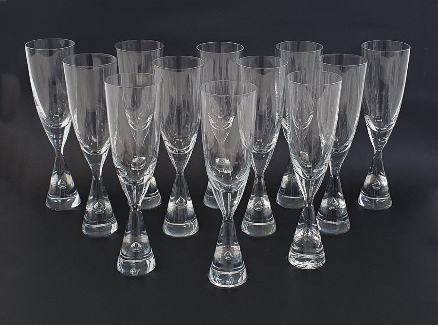 Set of 12 Holmegaard glass "Princess" champagne flutes designed by Bent Severin, the conical foot