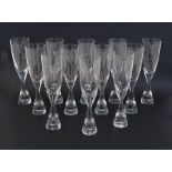 Set of 12 Holmegaard glass "Princess" champagne flutes designed by Bent Severin, the conical foot