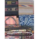 Assorted textiles , possibly Moroccan, to include embroidered, woven, belts, a kilim style soft bag,