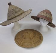Three vintage straw hats, possibly Ugandan (3)  Condition ReportA little general fraying of the