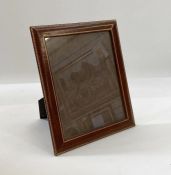 Asprey photograph frame , brown leather with gilt tooled decoration, glazed, to hold an 10 x 8