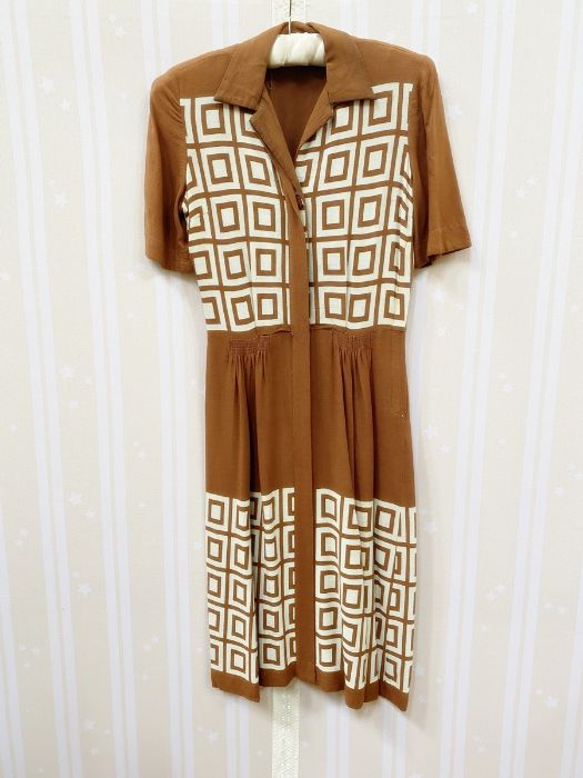 1940's cotton day dress in brown and cream with geometric pattern, shirt collar, short sleeves, hook